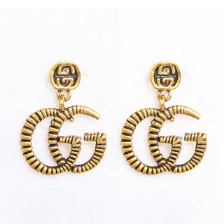 G snake earrings