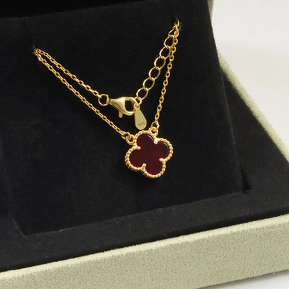 Gold shell clover necklace