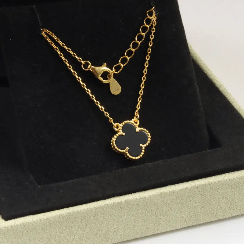 Gold shell clover necklace