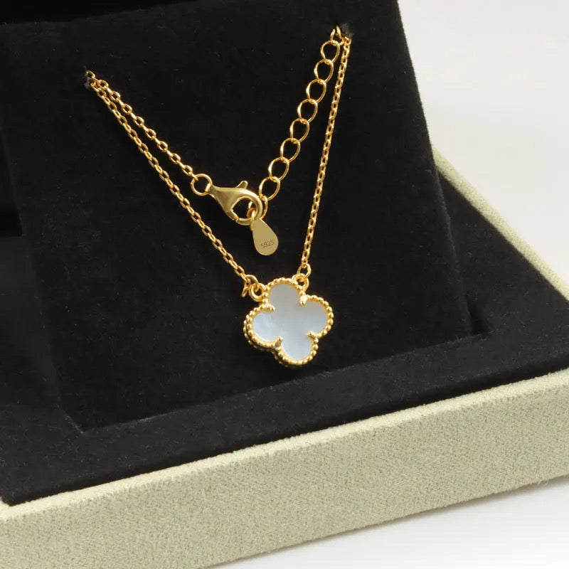 Gold shell clover necklace